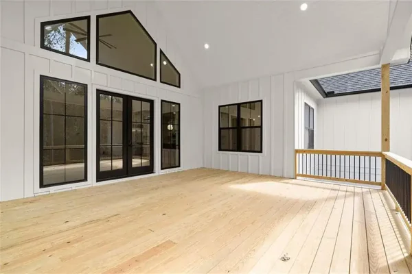 Bright modern outdoor deck at Bertamini Development by BLDCHomes.